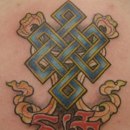 Tattoo Tibetan endless knot on back by Darko groenhagen