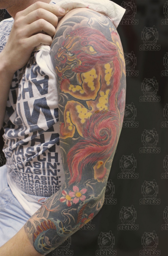 Tattoo Japanese fu dog snake arm by Darko groenhagen