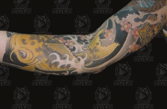 Tattoo Japanese golden koi arm by Darko groenhagen
