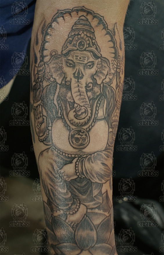 Indonesian and indian ganesha arm darko oneness tattoo