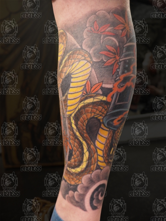 Tattoo Japanese demon and snake lowerleg by Darko groenhagen