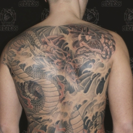Tattoo Japanese black and grey dragon by Darko groenhagen