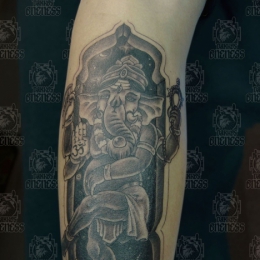 Tattoo Indonesian and indian arm ganesha by Darko groenhagen