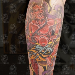 Tattoo Japanese demon and snake lowerleg by Darko groenhagen