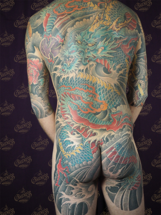 Darko dragon backpiece healed tattoo
