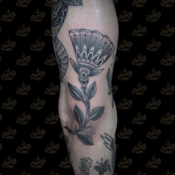 Vince graphic flower tattoo
