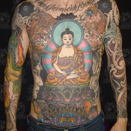 Tattoo Tibetan buddha and lotus by Darko groenhagen